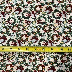 Festive Holiday Fabric with Wreath and Bow Design